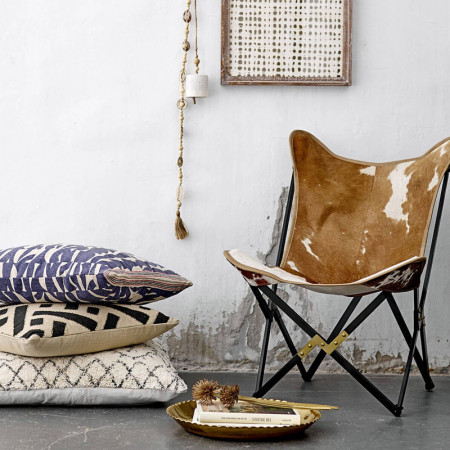 Fauteuil papillon en peau de vache design Bloomingville